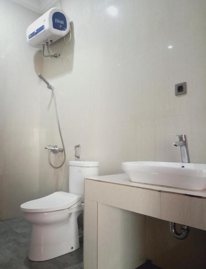 Almira homestay Jambi Exterior foto